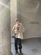 Beige faux fur Langry jacket with black pants and roller skates