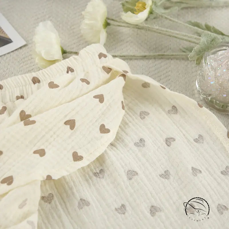 Summer cotton linen heart print slit shorts in cream fabric