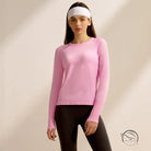 Pink langry quick-drying running top with black leggings and white headband