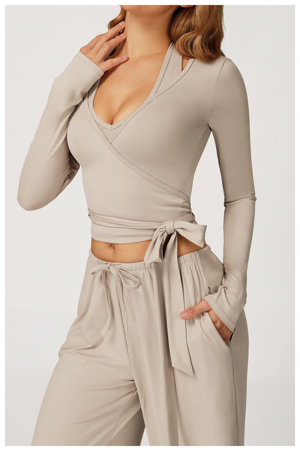 Beige Langry fashion wrap crop top with long sleeves and tie waist for yoga