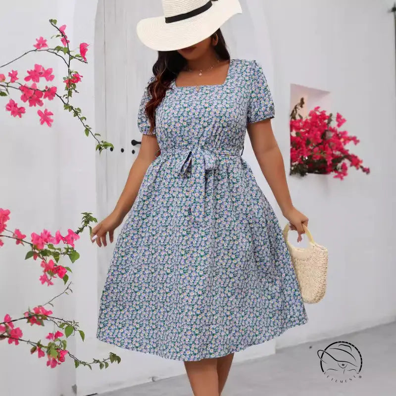 Light blue square-neck floral summer dress with puff sleeves and tie-waist