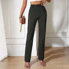 High-waisted black straight-leg pants for a casual office fashion look