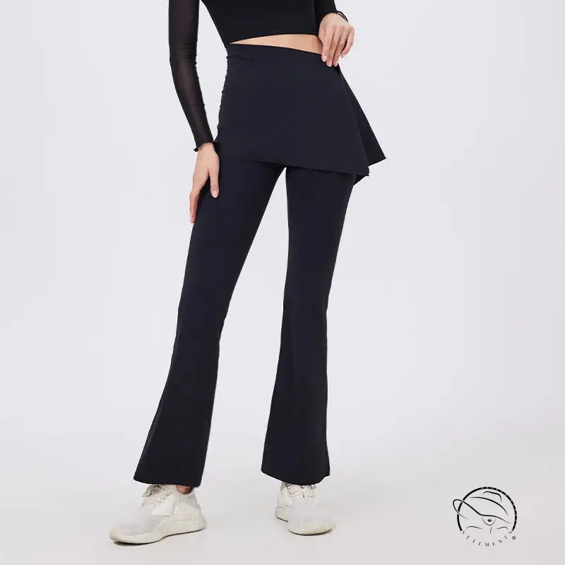Black hip lifting yoga pants with nude feel peplum hem and white sneakers