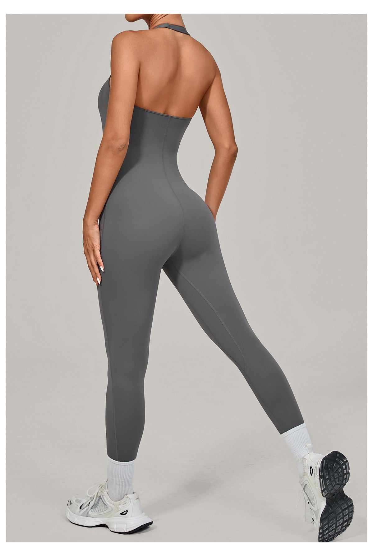 Gray langry halter yoga jumpsuit in seamless athletic fashion ملابس