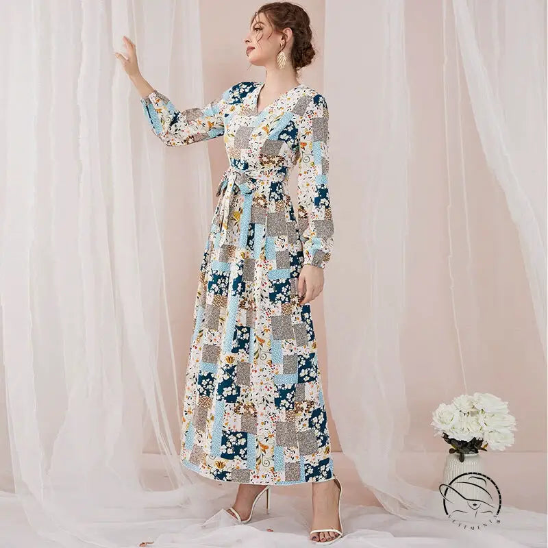 Woman in floral print slim fit maxi dress with patchwork patterns