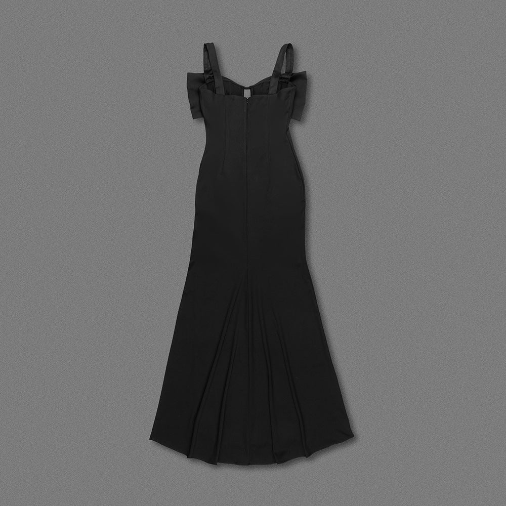 Elegant black maxi dress with cold-shoulder straps and mermaid silhouette in fashion