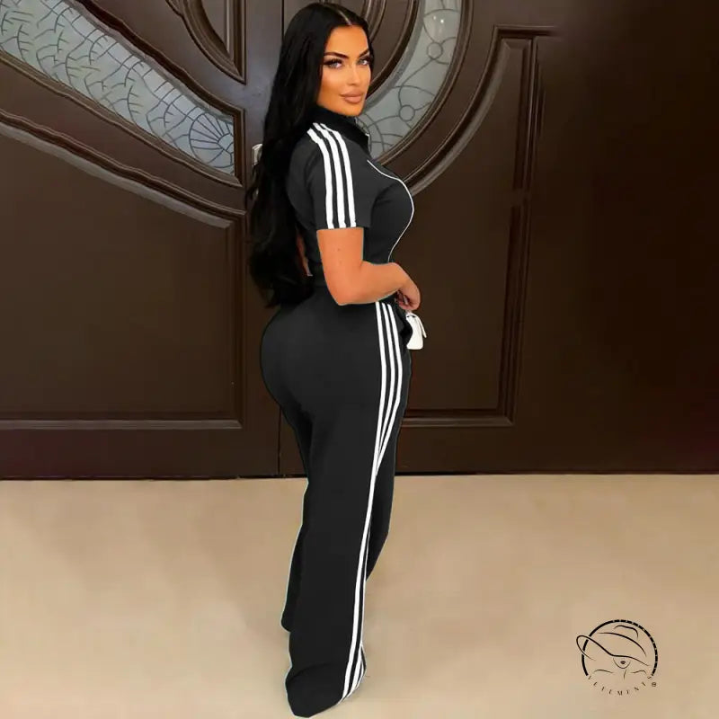 Black adidas tracksuit with white stripes, loose trousers in langry fashion