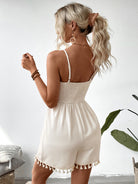 Cream-colored tassel-trimmed romper from Langry, perfect for stylish ملابس choices