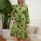 Green lotus leaf dress with black polka dots and ruffled hem