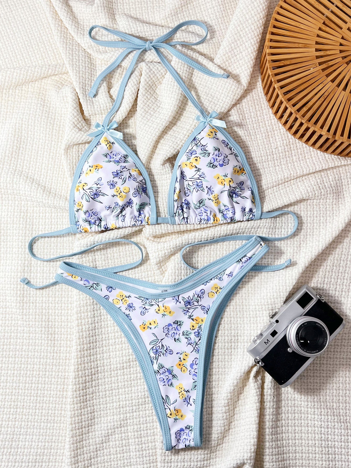 Light blue and white floral print string bikini for stylish summer fashion ملابس