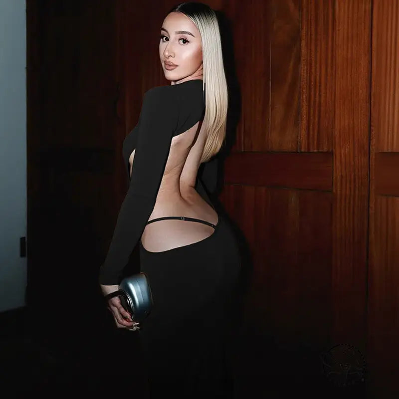 Elegant slim fit black high-slit dress with cutout design and long sleeves