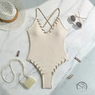 Stunning matching sling cream ribbed one-piece swimsuit