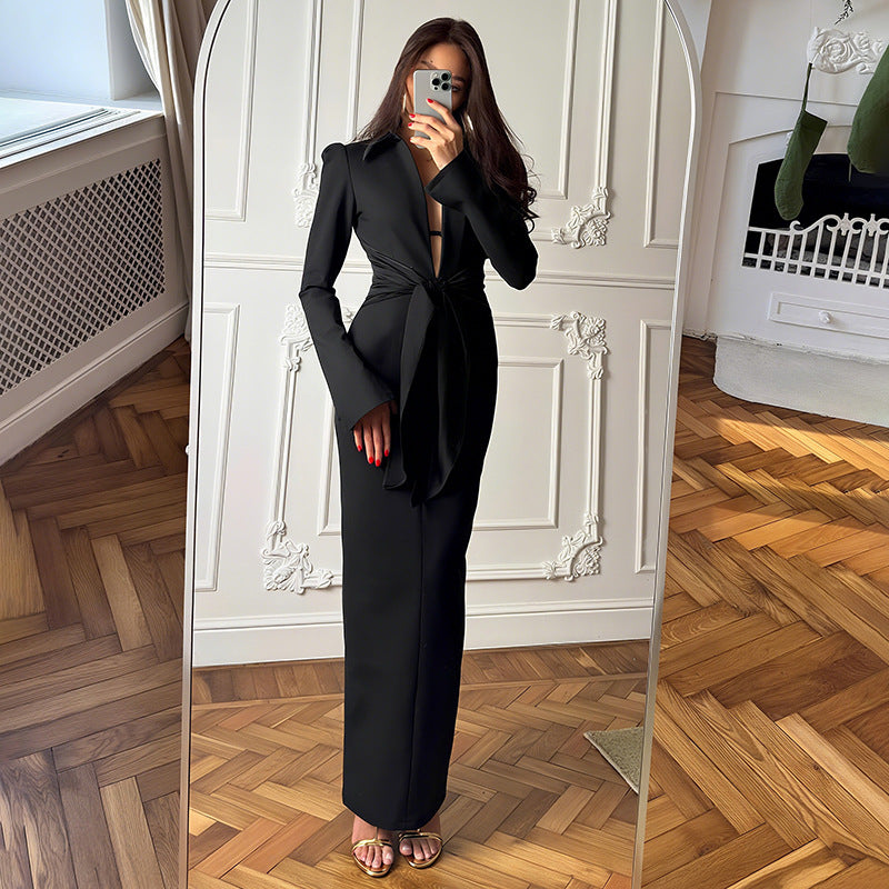 Gorgeous waist tight black tailored suit with wide lapels