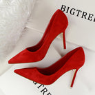 Red suede Langry stiletto pumps with gold accents and pointed toes