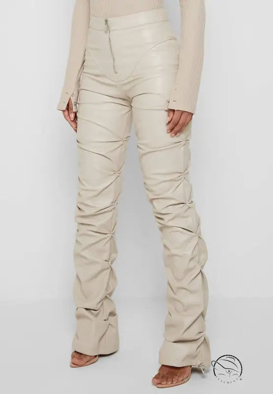 Tight faux leather pants in beige ruched style