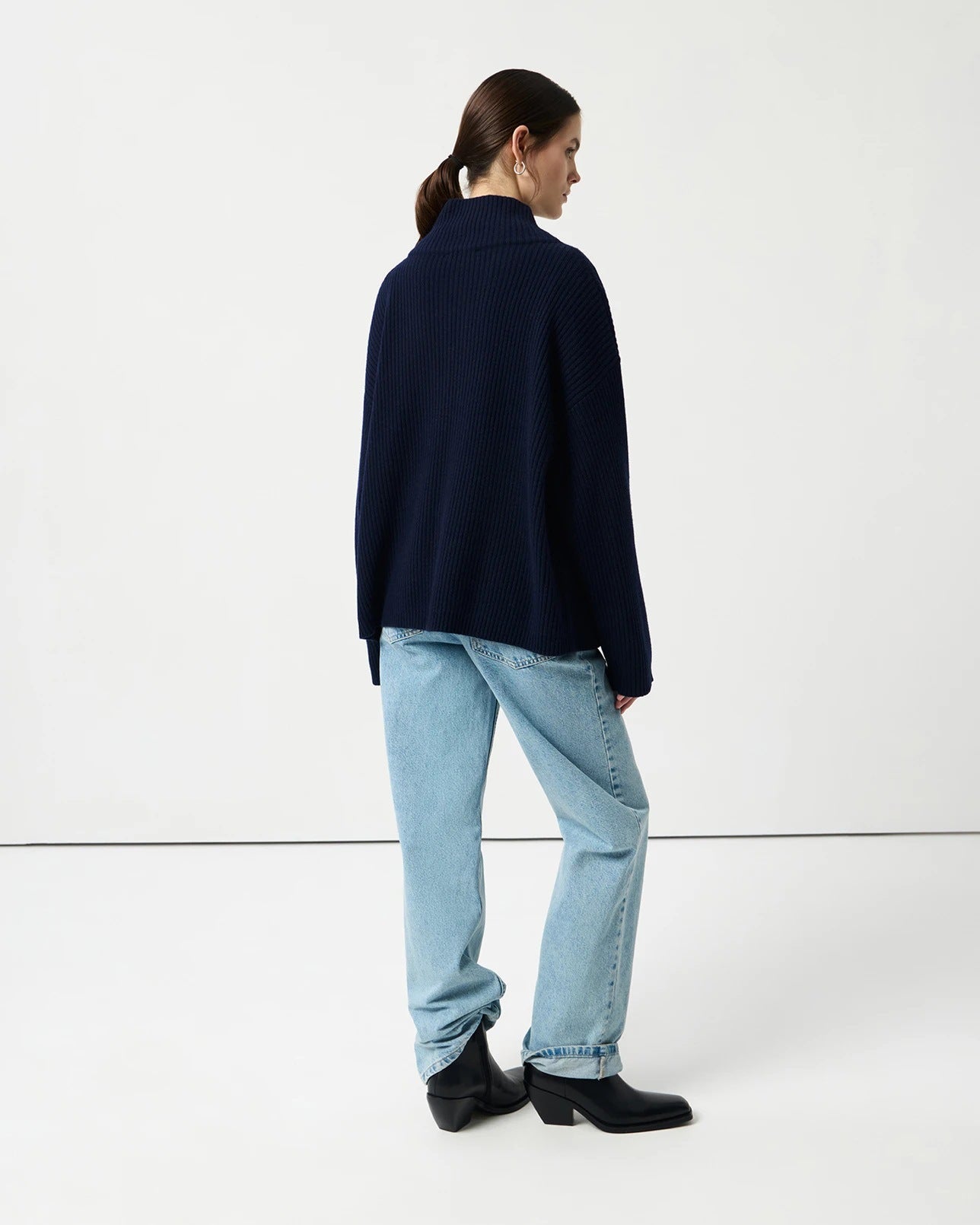 Navy blue cozy half high collar wool cardigan with black buttons and ribbed cuffs