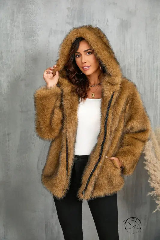 Loose faux fur hooded coat in brown with black trim and pockets from Langry fashion