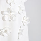 Elegant White Dress with Floral Embellishments for Women in Trendy Summer Fashion ملابس