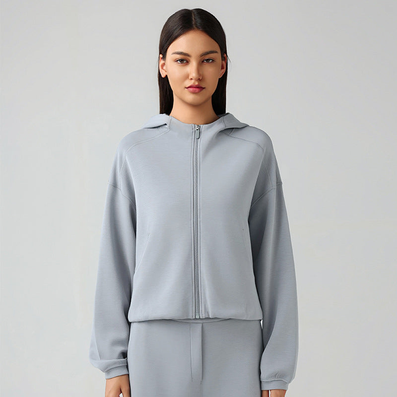 Light blue hooded zip-up jacket, a stylish choice for women’s autumn fashion ملابس