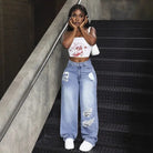 Woman in baggy match denim long jeans