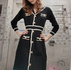 Knitted classic dress in black and white trim with gold buttons
