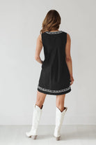 Black sleeveless dress showcasing the Beautiful Embroidered Vest Denim Dress fashion ملابس
