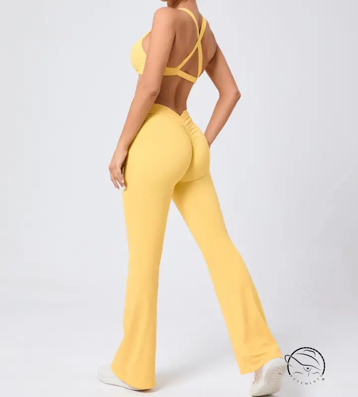 Peach hip raise tight brushed yoga backless jumpsuit with flared legs