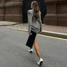 Langry fashion slim deep V plunge neck blazers dress in gray black asymmetrical style with high slit and white heels