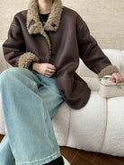 Brown leather jacket with fur trim collar and cuffs, a stylish choice for trendy ملابس