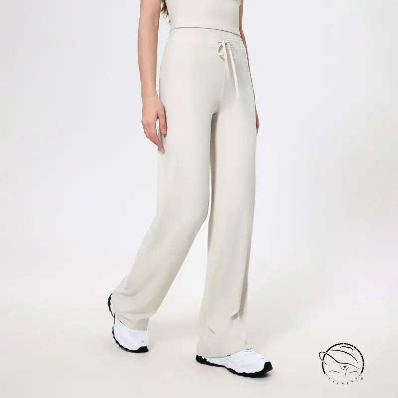 Langry loose quick drying cream drawstring sweatpants with white sneakers