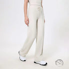 Langry loose quick drying cream drawstring sweatpants with white sneakers