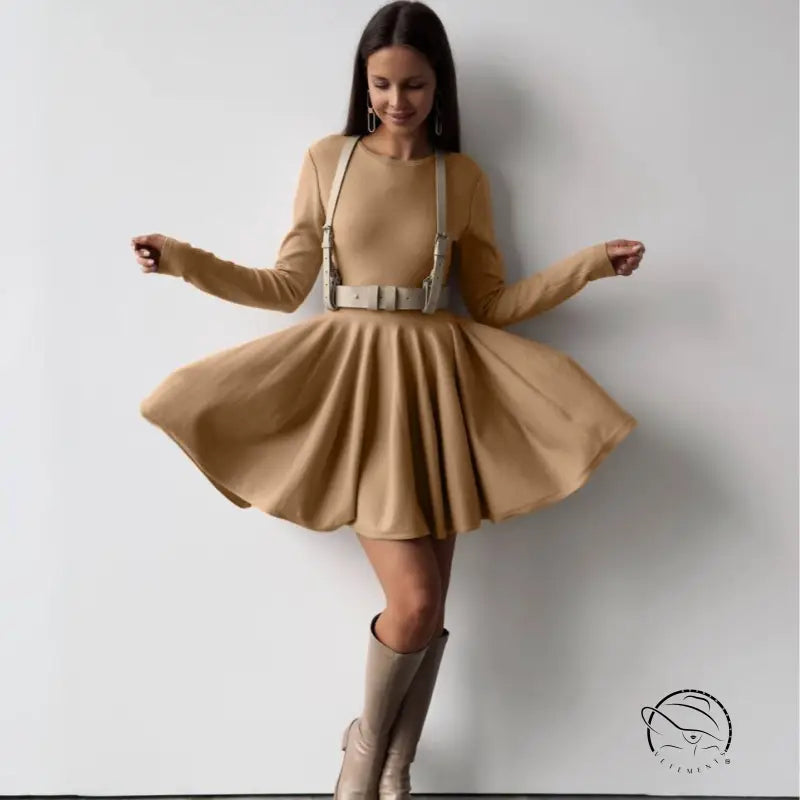 Beautiful woolen knitted dress on woman in tan dress with harness