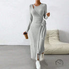 Warm knitted gray maxi dress with long sleeves, ribbed knit, side slit and self-tie waistband