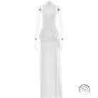 White long-sleeved maxi dress with high split, tight waist and silver embellishments