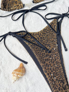 Leopard print string bikini with black ties featured in BIKINI DOUBLE THREE PIECE SET