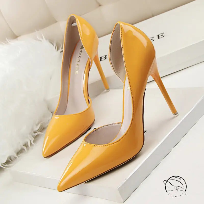Yellow patent leather low cut high heel stiletto pumps with pointed toes