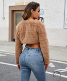 Tan faux fur cropped jacket with quilted panels and long sleeves