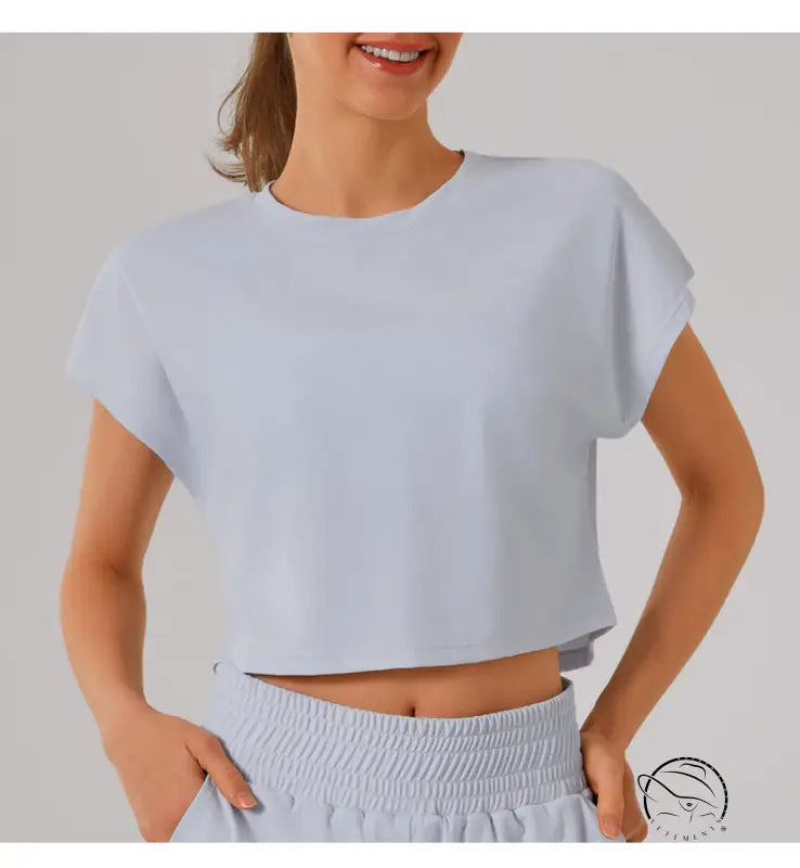 White loose cropped short-sleeve t-shirt from sports yoga fitness set