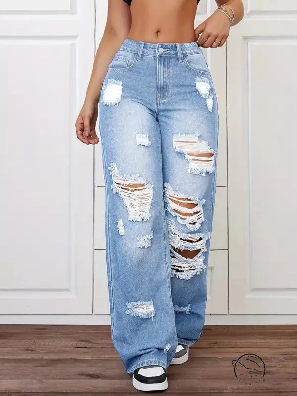 Light blue ripped high-waisted langry fashion jeans with black sneakers