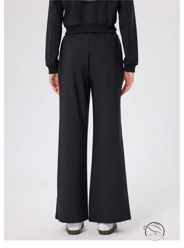 Black loose fitness warm pants with high waist and button closure