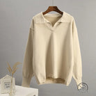 Cream-colored langry V-neck polo sweater in fashion ملابس