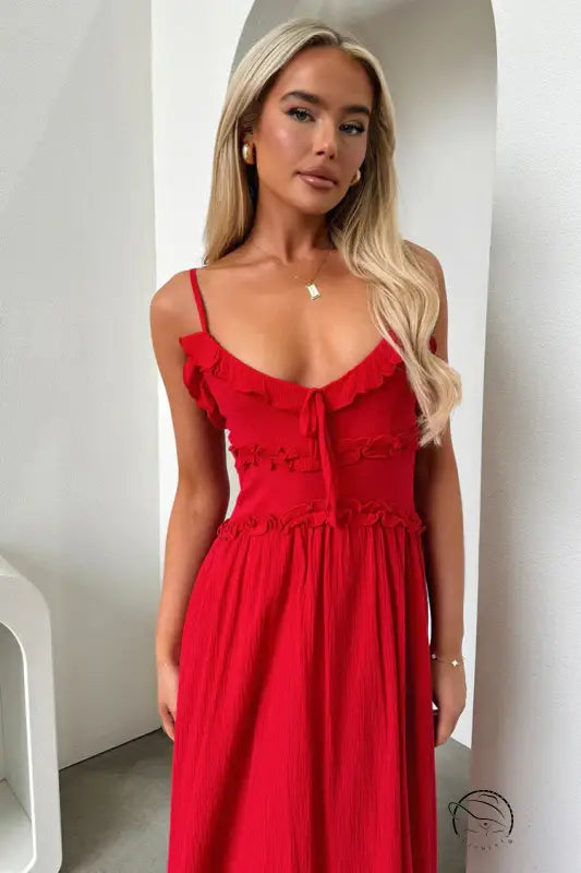 Vibrant red elegant loose dress with spaghetti straps and fitted bodice
