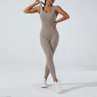 Sleek taupe langry yoga one-piece jumpsuit with racerback design