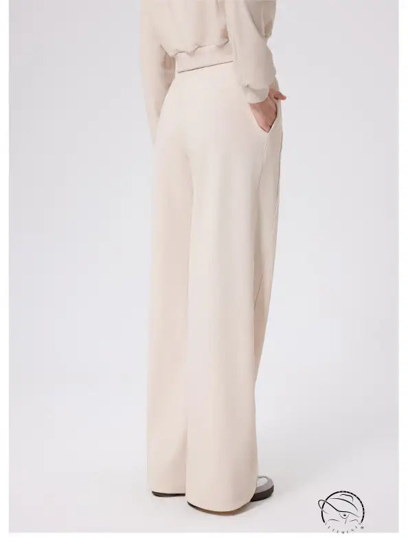 Cream-colored loose fitness warm pants with high-waist and belt loops