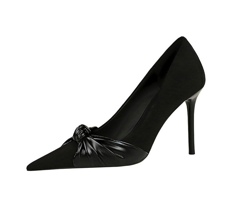 Langry fashionable black patent leather stiletto high heel with bow detail