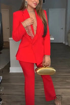 Red pantsuit with gold clutch in casual professional pants two piece set