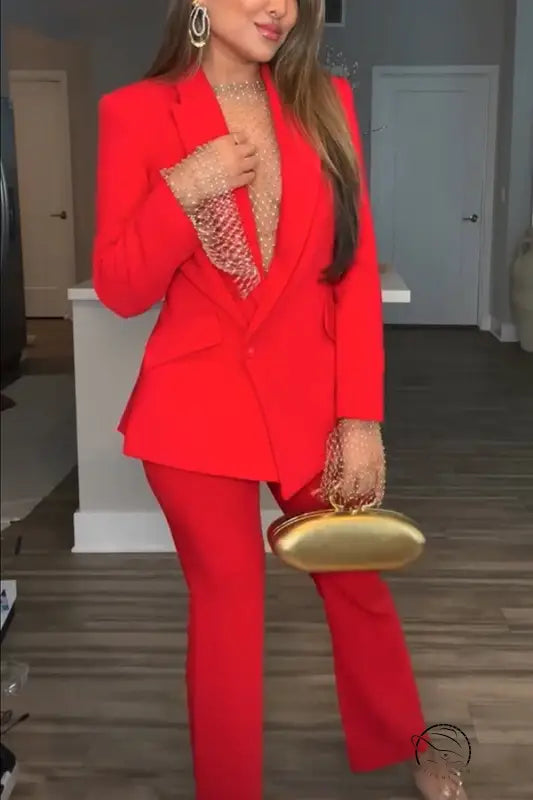 Red pantsuit with gold clutch in casual professional pants two piece set