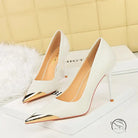 White langry fashion high-heeled pumps with gold toe caps