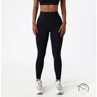 Black high-waisted yoga pants with white sneakers for Langry fashion