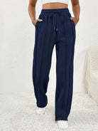 Navy blue wide leg drawstring sweatpants with side pockets for casual fashion wear